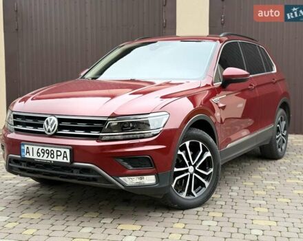 Червоний Фольксваген Тігуан, об'ємом двигуна 1.98 л та пробігом 209 тис. км за 22999 $, фото 1 на Automoto.ua