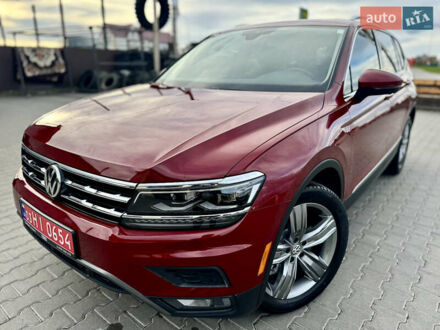 Красный Фольксваген Тигуан, объемом двигателя 2 л и пробегом 52 тыс. км за 22900 $, фото 1 на Automoto.ua