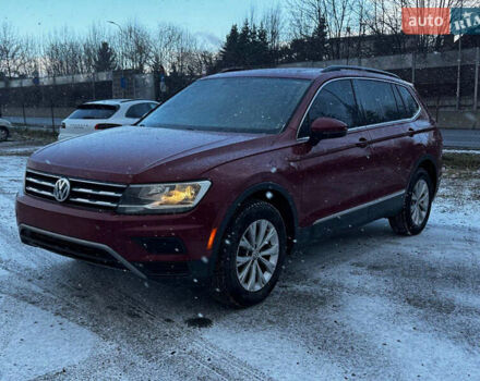 Красный Фольксваген Тигуан, объемом двигателя 2 л и пробегом 90 тыс. км за 14900 $, фото 1 на Automoto.ua