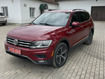 Червоний Фольксваген Тігуан, об'ємом двигуна 1.98 л та пробігом 151 тис. км за 16900 $, фото 1 на Automoto.ua