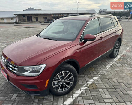 Красный Фольксваген Тигуан, объемом двигателя 1.98 л и пробегом 176 тыс. км за 16988 $, фото 1 на Automoto.ua