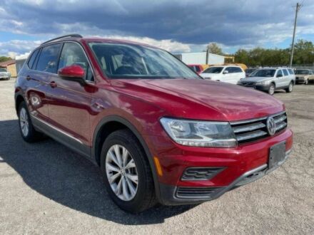 Червоний Фольксваген Тігуан, об'ємом двигуна 2 л та пробігом 49 тис. км за 9850 $, фото 1 на Automoto.ua