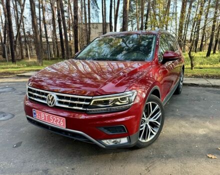 Красный Фольксваген Тигуан, объемом двигателя 2 л и пробегом 91 тыс. км за 18900 $, фото 1 на Automoto.ua