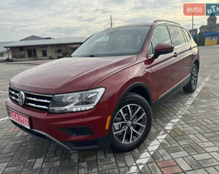 Червоний Фольксваген Тігуан, об'ємом двигуна 1.98 л та пробігом 176 тис. км за 16588 $, фото 1 на Automoto.ua