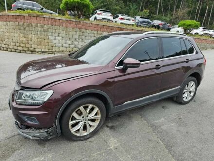 Червоний Фольксваген Тігуан, об'ємом двигуна 2 л та пробігом 67 тис. км за 6500 $, фото 1 на Automoto.ua