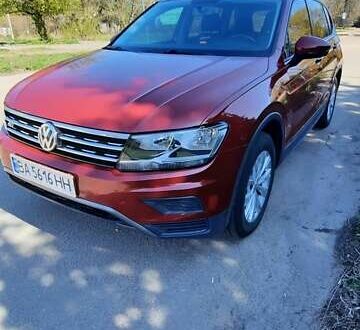 Червоний Фольксваген Тігуан, об'ємом двигуна 1.98 л та пробігом 124 тис. км за 22500 $, фото 1 на Automoto.ua