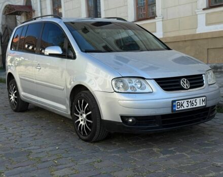 Серый Фольксваген Тигуан, объемом двигателя 1.4 л и пробегом 260 тыс. км за 5000 $, фото 1 на Automoto.ua