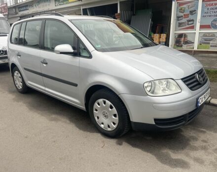 Серый Фольксваген Тигуан, объемом двигателя 1.6 л и пробегом 207 тыс. км за 5000 $, фото 2 на Automoto.ua