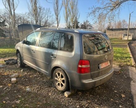 Серый Фольксваген Тигуан, объемом двигателя 2 л и пробегом 140 тыс. км за 1425 $, фото 3 на Automoto.ua