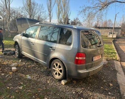 Серый Фольксваген Тигуан, объемом двигателя 2 л и пробегом 140 тыс. км за 1425 $, фото 2 на Automoto.ua