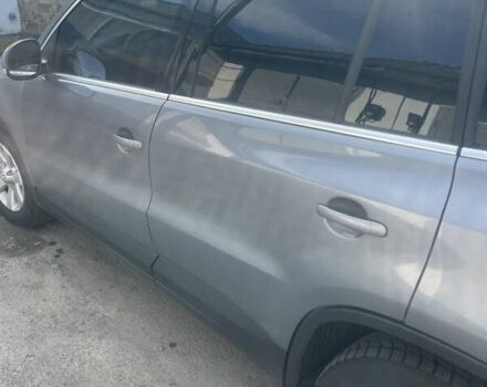 Серый Фольксваген Тигуан, объемом двигателя 1.39 л и пробегом 260 тыс. км за 7500 $, фото 1 на Automoto.ua