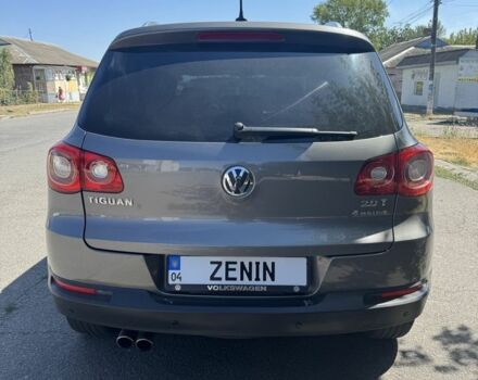 Серый Фольксваген Тигуан, объемом двигателя 2 л и пробегом 222 тыс. км за 9800 $, фото 2 на Automoto.ua