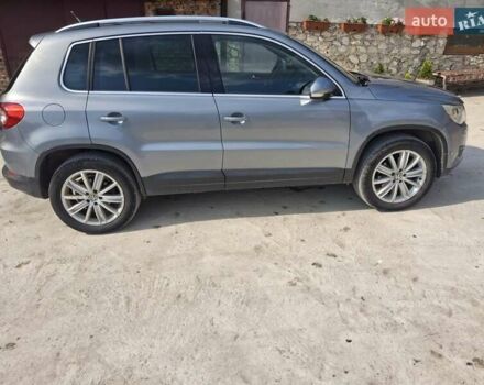 Сірий Фольксваген Тігуан, об'ємом двигуна 2 л та пробігом 300 тис. км за 10300 $, фото 3 на Automoto.ua