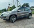 Серый Фольксваген Тигуан, объемом двигателя 1.4 л и пробегом 185 тыс. км за 9200 $, фото 3 на Automoto.ua