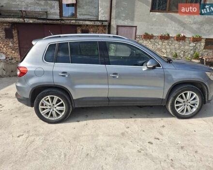 Сірий Фольксваген Тігуан, об'ємом двигуна 2 л та пробігом 300 тис. км за 10300 $, фото 5 на Automoto.ua