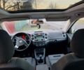 Серый Фольксваген Тигуан, объемом двигателя 1.4 л и пробегом 249 тыс. км за 8800 $, фото 1 на Automoto.ua