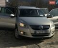 Серый Фольксваген Тигуан, объемом двигателя 1.4 л и пробегом 250 тыс. км за 8500 $, фото 1 на Automoto.ua