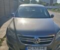 Сірий Фольксваген Тігуан, об'ємом двигуна 1.4 л та пробігом 253 тис. км за 9300 $, фото 1 на Automoto.ua