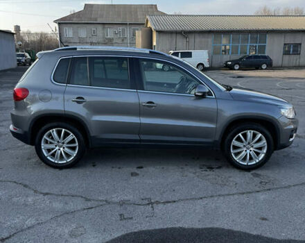 Сірий Фольксваген Тігуан, об'ємом двигуна 1.98 л та пробігом 268 тис. км за 10800 $, фото 4 на Automoto.ua
