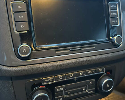 Серый Фольксваген Тигуан, объемом двигателя 1.98 л и пробегом 128 тыс. км за 11000 $, фото 4 на Automoto.ua