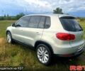 Сірий Фольксваген Тігуан, об'ємом двигуна 2 л та пробігом 260 тис. км за 9900 $, фото 1 на Automoto.ua