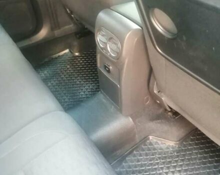 Серый Фольксваген Тигуан, объемом двигателя 1.97 л и пробегом 412 тыс. км за 10000 $, фото 2 на Automoto.ua