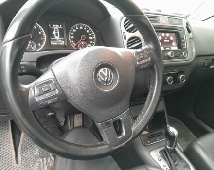 Серый Фольксваген Тигуан, объемом двигателя 2 л и пробегом 217 тыс. км за 12000 $, фото 1 на Automoto.ua