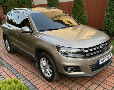 Серый Фольксваген Тигуан, объемом двигателя 1.4 л и пробегом 250 тыс. км за 10000 $, фото 2 на Automoto.ua