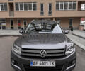 Сірий Фольксваген Тігуан, об'ємом двигуна 1.98 л та пробігом 225 тис. км за 10400 $, фото 1 на Automoto.ua
