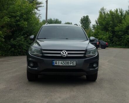 Сірий Фольксваген Тігуан, об'ємом двигуна 2 л та пробігом 205 тис. км за 12200 $, фото 1 на Automoto.ua