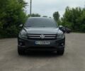 Сірий Фольксваген Тігуан, об'ємом двигуна 2 л та пробігом 205 тис. км за 12200 $, фото 1 на Automoto.ua