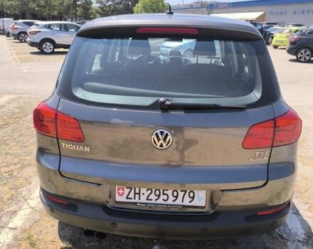 Серый Фольксваген Тигуан, объемом двигателя 1.4 л и пробегом 195 тыс. км за 8311 $, фото 4 на Automoto.ua