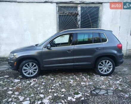 Сірий Фольксваген Тігуан, об'ємом двигуна 2 л та пробігом 150 тис. км за 11000 $, фото 2 на Automoto.ua