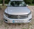 Сірий Фольксваген Тігуан, об'ємом двигуна 1.98 л та пробігом 200 тис. км за 13000 $, фото 1 на Automoto.ua