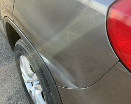 Серый Фольксваген Тигуан, объемом двигателя 1.98 л и пробегом 220 тыс. км за 11000 $, фото 6 на Automoto.ua