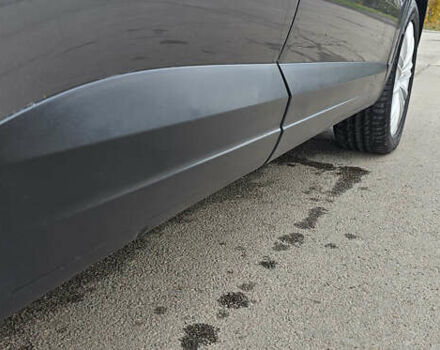 Серый Фольксваген Тигуан, объемом двигателя 2 л и пробегом 260 тыс. км за 13450 $, фото 9 на Automoto.ua