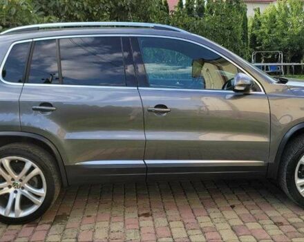 Серый Фольксваген Тигуан, объемом двигателя 2 л и пробегом 170 тыс. км за 12500 $, фото 2 на Automoto.ua