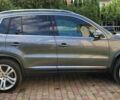 Серый Фольксваген Тигуан, объемом двигателя 2 л и пробегом 170 тыс. км за 12500 $, фото 2 на Automoto.ua
