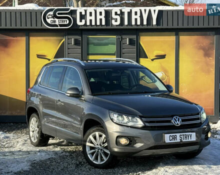 Серый Фольксваген Тигуан, объемом двигателя 2 л и пробегом 205 тыс. км за 15500 $, фото 1 на Automoto.ua