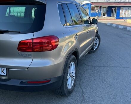 Сірий Фольксваген Тігуан, об'ємом двигуна 2 л та пробігом 245 тис. км за 17666 $, фото 1 на Automoto.ua