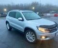 Серый Фольксваген Тигуан, объемом двигателя 2 л и пробегом 176 тыс. км за 10999 $, фото 1 на Automoto.ua