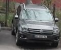 Сірий Фольксваген Тігуан, об'ємом двигуна 2 л та пробігом 150 тис. км за 11000 $, фото 4 на Automoto.ua