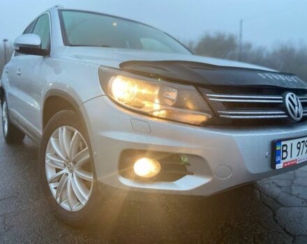 Серый Фольксваген Тигуан, объемом двигателя 2 л и пробегом 176 тыс. км за 10999 $, фото 2 на Automoto.ua