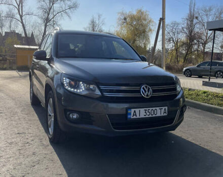 Серый Фольксваген Тигуан, объемом двигателя 1.97 л и пробегом 240 тыс. км за 15600 $, фото 2 на Automoto.ua