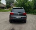 Сірий Фольксваген Тігуан, об'ємом двигуна 2 л та пробігом 205 тис. км за 12200 $, фото 5 на Automoto.ua