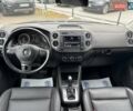 Сірий Фольксваген Тігуан, об'ємом двигуна 1.98 л та пробігом 132 тис. км за 11700 $, фото 10 на Automoto.ua