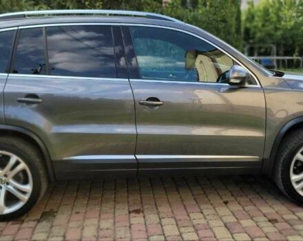 Серый Фольксваген Тигуан, объемом двигателя 2 л и пробегом 170 тыс. км за 12500 $, фото 3 на Automoto.ua