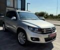 Серый Фольксваген Тигуан, объемом двигателя 2 л и пробегом 215 тыс. км за 9700 $, фото 1 на Automoto.ua