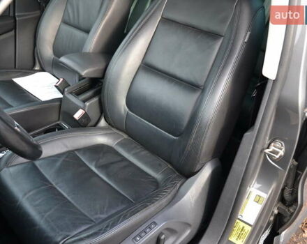 Сірий Фольксваген Тігуан, об'ємом двигуна 1.98 л та пробігом 310 тис. км за 10999 $, фото 12 на Automoto.ua