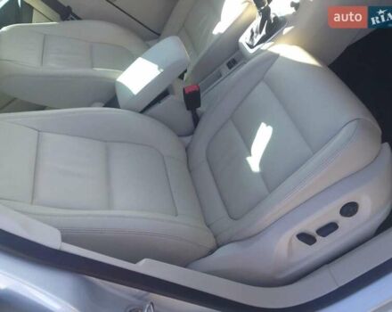 Сірий Фольксваген Тігуан, об'ємом двигуна 2 л та пробігом 165 тис. км за 12200 $, фото 1 на Automoto.ua